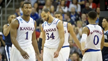 Mar 26, 2016; Louisville, KY, USA; Kansas Jayhawks forward Perry Ellis (34) reacts during the second half against the Villanova Wildcats in the south regional final of the NCAA Tournament at KFC YUM!. Mandatory Credit: Jamie Rhodes-USA TODAY Sports