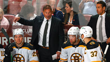 SUNRISE, FL - OCTOBER 27: Head coach Bruce Cassidy of the Boston Bruins directs the players during a break in action against the Florida Panthers at the FLA Live Arena on October 27, 2021 in Sunrise, Florida. (Photo by Joel Auerbach/Getty Images)