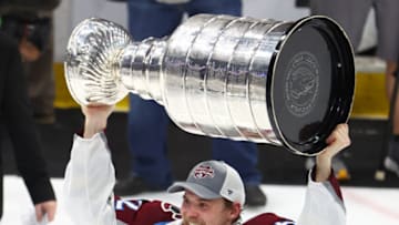 Jun 26, 2022; Tampa, Florida, USA; Colorado Avalanche left wing Artturi Lehkonen (62) celebrates with the Stanley Cup after defeating the Tampa Bay Lightning during game six of the 2022 Stanley Cup Final at Amalie Arena. Mandatory Credit: Mark J. Rebilas-USA TODAY Sports