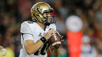 CINCINNATI, OH - OCTOBER 07: McKenzie Milton #10 of the UCF Knights looks to pass against the Cincinnati Bearcats during the first half at Nippert Stadium on October 7, 2017 in Cincinnati, Ohio. (Photo by Michael Reaves/Getty Images)