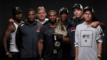 ANAHEIM, CA - JULY 29: UFC welterweight champion Tyron Woodley (C) poses for a post fight portrait backstage during the UFC 214 event inside the Honda Center on July 29, 2017 in Anaheim, California. (Photo by Mike Roach/Zuffa LLC/Zuffa LLC via Getty Images)