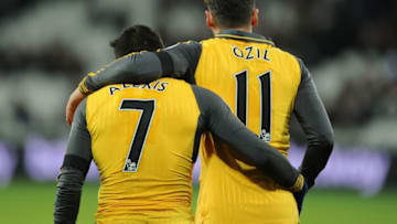 STRATFORD, ENGLAND - DECEMBER 03: (L-R) Alexis Sanchez and Mesut Ozil of Arsenal during the Premier League match between West Ham United and Arsenal at London Stadium on December 3, 2016 in Stratford, England. (Photo by Stuart MacFarlane/Arsenal FC via Getty Images)