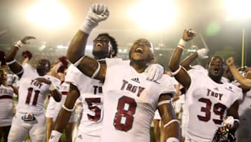 Sep 17, 2016; Hattiesburg, MS, USA; Troy Trojans wide receiver Emanuel Thompson (8) celebrates with teammates at the end of their game against the Southern Miss Golden Eagles at M.M. Roberts Stadium. Troy won 37-31. Mandatory Credit: Chuck Cook-USA TODAY Sports