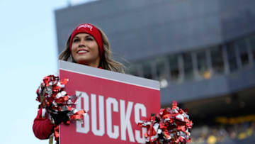 Nov. 25, 2023; Ann Arbor, Mi., USA;An Ohio State cheerleader holds a sign during the first half of Saturday's NCAA Division I football game between the Ohio State Buckeyes and the Michigan Wolverines at Michigan Stadium.