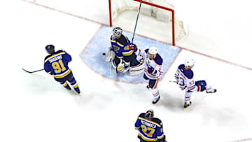 Dec 19, 2016; St. Louis, MO, USA; Edmonton Oilers center Ryan Nugent-Hopkins (93) celebrates with defenseman Andrej Sekera (2) after scoring the game-winning goal in overtime against St. Louis Blues goalie Carter Hutton (40) as right wing Vladimir Tarasenko (91) and defenseman Alex Pietrangelo (27) look on at Scottrade Center. The Oilers won 3-2. Mandatory Credit: Billy Hurst-USA TODAY Sports
