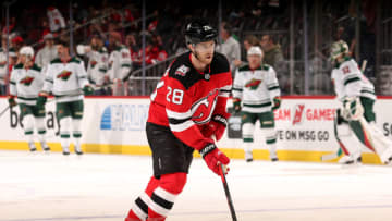 NEWARK, NEW JERSEY - MARCH 21: Damon Severson #28 of the New Jersey Devils skates during warm ups before the game against the Minnesota Wild at Prudential Center on March 21, 2023 in Newark, New Jersey. (Photo by Elsa/Getty Images)