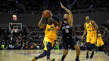 Utah Jazz´ Donovan Mitchell (L) vies for the ball with Orlando Magic's Evan Fournier during their NBA Global Games match at the Mexico City Arena, on December 15, 2018, in Mexico City. (Photo by PEDRO PARDO / AFP) (Photo credit should read PEDRO PARDO/AFP/Getty Images)