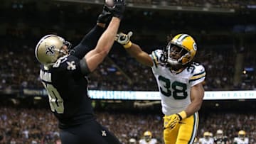 NEW ORLEANS, LA - OCTOBER 26: Jimmy Graham #80 of the New Orleans Saints catches a pass for a touchdown as Tramon Williams #38 of the Green Bay Packers tries to defend during the second half at Mercedes-Benz Superdome on October 26, 2014 in New Orleans, Louisiana. (Photo by Chris Graythen/Getty Images)