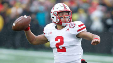IOWA CITY, IOWA- NOVEMBER 23: Quarterback Adrian Martinez #2 of the Nebraska Cornhuskers throws a pass in the second half against the Iowa Hawkeyes, on November 23, 2018 at Kinnick Stadium, in Iowa City, Iowa. (Photo by Matthew Holst/Getty Images)