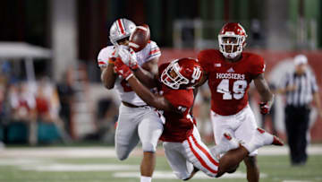 BLOOMINGTON, IN - AUGUST 31: J.K. Dobbins #2 of the Ohio State Buckeyes attempts to catch the ball while Tony Fields #19 of the Indiana Hoosiers knocks it away during the game at Memorial Stadium on August 31, 2017 in Bloomington, Indiana. (Photo by Andy Lyons/Getty Images)