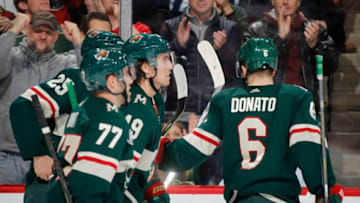 ST. PAUL, MN - APRIL 02: After scoring a 1st period goal Victor Rask #49 of the Minnesota Wild is congratulated by Ryan Donato #6 of the Minnesota Wild, Brad Hunt #77 of the Minnesota Wild and Jonas Brodin #25 of the Minnesota Wild during a game with the Winnipeg Jets at Xcel Energy Center on April 2, 2019 in St. Paul, Minnesota.(Photo by Bruce Kluckhohn/NHLI via Getty Images)