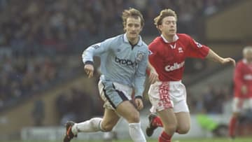 15 Feb 1997: Nicky Summerbee of Manchester City holds off the challenge from Craig Hignett off Middlesbrough during the FA Cup Fifth round match between Manchester City and Middlesbrough at Maine Road in Manchester. Middlesbrough won the match 0-1. \ Mandatory Credit: Shaun Botterill /Allsport