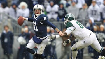STATE COLLEGE, PA - NOVEMBER 27: Quarterback Matt McGloin #11 of the Penn State Nittany Lions scrambles out of the pocket during a game against the Michigan State Spartans on November 27, 2010 at Beaver Stadium in State College, Pennsylvania. The Spartans won 28-22. (Photo by Hunter Martin/Getty Images)
