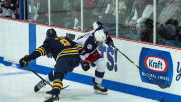 CLINTON, NY - SEPTEMBER 25: Buffalo Sabers Right Defenseman Casey Nelson (8) checks Columbus Blue Jackets Defenseman Seth Jones (3) into the boards during the second period of the Columbus Blue Jackets versus the Buffalo Sabers preseason game on September 25, 2018, at Clinton Arena in Clinton, New York. (Photo by Gregory Fisher/Icon Sportswire via Getty Images)