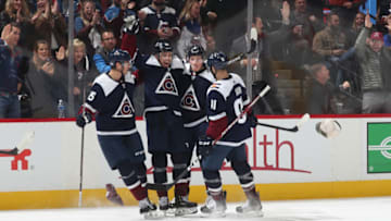 DENVER, COLORADO - NOVEMBER 07: Joonas Donskoi #72 of the Colorado Avalanche celebrates his third goal of the game against the Nashville Predators with teammates Andre Burakovsky #95, Nazem Kadri #91 and Cale Makar #8 as hats fall from the stands at Pepsi Center on November 07, 2019 in Denver, Colorado. The Avalanche defeated the Predators 9-4. (Photo by Michael Martin/NHLI via Getty Images)