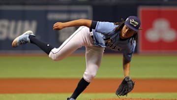 ST. PETERSBURG, FL - MAY 06: Chris Archer (22) of the Rays follows thru after delivering a pitch to the plate during the MLB regular season game between the Toronto Blue Jays and the Tampa Bay Rays on May 06, 2018, at Tropicana Field in St. Petersburg, FL. (Photo by Cliff Welch/Icon Sportswire via Getty Images)