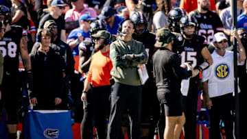 Florida coach Billy Napier looks at the scoreboard during the second half against Arkansas at Steve Spurrier Field at Ben Hill Griffin Stadium in Gainesville, Fla.