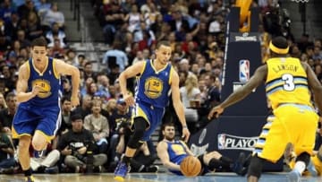 Apr 23, 2013; Denver, CO, USA; Golden State Warriors point guard Stephen Curry (30) and shooting guard Klay Thompson (11) move up court against Denver Nuggets point guard Ty Lawson (3) during game two in the first round of the 2013 NBA playoffs at the Pepsi Center. Mandatory Credit: Isaiah J. Downing-USA TODAY Sports