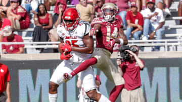 TALLAHASSEE, FL - SEPTEMBER 21: Tight End Jordan Davis #85 of the Louisville Cardinals makes a catch over Cornerback Kyle Meyers #14 of the Florida State Seminoles during the game at Doak Campbell Stadium on Bobby Bowden Field on September 21, 2019 in Tallahassee, Florida. The Seminoles defeated the Cardinals 35 to 24. (Photo by Don Juan Moore/Getty Images)