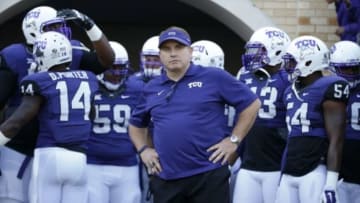 Dec 6, 2014; Fort Worth, TX, USA; TCU Horned Frogs head coach Gary Patterson leads his team out onto the field before the game against the Iowa State Cyclones at Amon G. Carter Stadium. Mandatory Credit: Kevin Jairaj-USA TODAY Sports