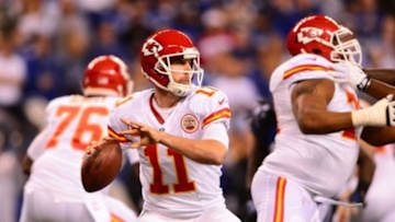 Jan 4, 2014; Indianapolis, IN, USA; Kansas City Chiefs quarterback Alex Smith (11) during the 2013 AFC wild card playoff football game against the Indianapolis Colts at Lucas Oil Stadium. Mandatory Credit: Andrew Weber-USA TODAY Sports