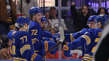Dec 29, 2021; Buffalo, New York, USA; Buffalo Sabres right wing Tage Thompson (72) celebrates his goal with teammates during the second period against the New Jersey Devils at KeyBank Center. Mandatory Credit: Timothy T. Ludwig-USA TODAY Sports