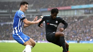 BRIGHTON, ENGLAND - JANUARY 20: Michy Batshuayi of Chelsea shields the ball from Lewis Dunk of Brighton and Hove Albion during the Premier League match between Brighton and Hove Albion and Chelsea at Amex Stadium on January 20, 2018 in Brighton, England. (Photo by Bryn Lennon/Getty Images)