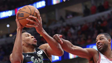 CHICAGO, ILLINOIS - MARCH 04: Giannis Antetokounmpo #34 of the Milwaukee Bucks rebounds against Tristan Thompson #3 of the Chicago Bulls at the United Center on March 04, 2022 in Chicago, Illinois. The Bucks defeated the Bulls 118-112. NOTE TO USER: User expressly acknowledges and agrees that, by downloading and or using this photograph, User is consenting to the terms and conditions of the Getty Images License Agreement. (Photo by Jonathan Daniel/Getty Images)