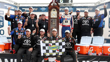MARTINSVILLE, VIRGINIA - OCTOBER 26: Kyle Busch Motorsports celebrates with Todd Gilliland, NASCAR Truck Series driver of the #4 Mobil 1 Toyota, after winning the 2019 NASCAR Hall of Fame 200 at Martinsville Speedway (Photo by Brian Lawdermilk/Getty Images)