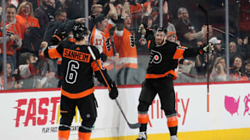 PHILADELPHIA, PA - FEBRUARY 01: Kevin Hayes #13 of the Philadelphia Flyers celebrates his third period shorthanded goal against the Colorado Avalanche with Travis Sanheim #6 on February 1, 2020 at the Wells Fargo Center in Philadelphia, Pennsylvania. The goal was Hayes' second of the game. The Flyers went on to defeat the Avalanche 6-3. (Photo by Len Redkoles/NHLI via Getty Images)