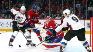 Nov 14, 2015; Montreal, Quebec, CAN; Montreal Canadiens goalie Mike Condon (39) makes a save against Colorado Avalanche center Mikhail Grigorenko (25) and center Matt Duchene (9) and defenseman P.K. Subban (76) during the second period at Bell Centre. Mandatory Credit: Jean-Yves Ahern-USA TODAY Sports