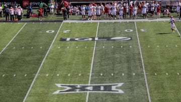 Sep 23, 2023; Cincinnati, Ohio, USA; A general view of the TQL and Big 12 logos on the field during the second half in the game between the Oklahoma Sooners and the Cincinnati Bearcats at Nippert Stadium. Mandatory Credit: Katie Stratman-USA TODAY Sports