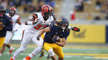 BERKELEY, CA - NOVEMBER 04: Kanawai Noa #9 of the California Golden Bears is tackled by Kee Whetzel #37 of the Oregon State Beavers at California Memorial Stadium on November 4, 2017 in Berkeley, California. (Photo by Ezra Shaw/Getty Images)