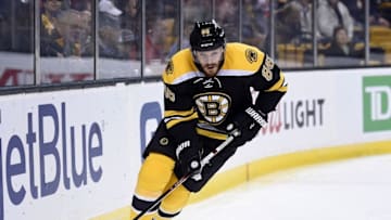 Apr 7, 2016; Boston, MA, USA; Boston Bruins defenseman Kevan Miller (86) skates with the puck during the first period against the Detroit Red Wings at TD Garden. Mandatory Credit: Bob DeChiara-USA TODAY Sports