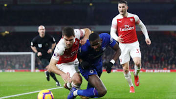 LONDON, ENGLAND - JANUARY 19: Antonio Ruediger of Chelsea battles for possession with Sokratis Papastathopoulos of Arsenal during the Premier League match between Arsenal FC and Chelsea FC at Emirates Stadium on January 19, 2019 in London, United Kingdom. (Photo by Clive Rose/Getty Images)