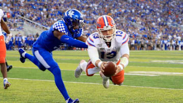 LEXINGTON, KENTUCKY - SEPTEMBER 14: Feleipe Franks #13 of the Florida Gators dives for the goal line against the Kentucky Wildcats at Commonwealth Stadium on September 14, 2019 in Lexington, Kentucky. (Photo by Andy Lyons/Getty Images)