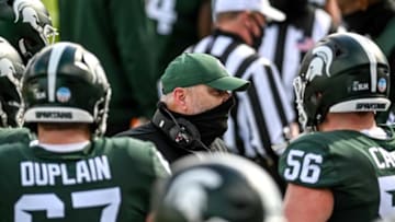 Michigan State's offensive line coach Chris Kapilovic talks with players during the second quarter of the game against Rutgers on Saturday, Oct. 24, 2020, at Spartan Stadium in East Lansing.201024 Msu Rutgers 130a