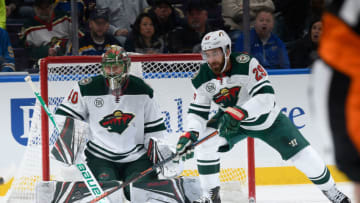 ST. LOUIS, MO - NOVEMBER 11: Devan Dubnyk #40 of the Minnesota Wild and Greg Pateryn #29 of the Minnesota Wild defend the net against the St. Louis Blues at Enterprise Center on November 11, 2018 in St. Louis, Missouri. (Photo by Scott Rovak/NHLI via Getty Images)