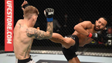 ABU DHABI, UNITED ARAB EMIRATES - OCTOBER 04: (R-L) Kyler Phillips kicks Cameron Else of England in their bantamweight bout during the UFC Fight Night event inside Flash Forum on UFC Fight Island on October 04, 2020 in Abu Dhabi, United Arab Emirates. (Photo by Josh Hedges/Zuffa LLC)