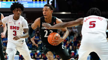 Cincinnati Bearcats guard Mika Adams-Woods drives to basket against the SMU Mustangs at Moody Coliseum. USA Today.