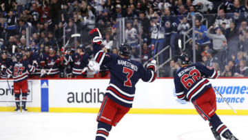 Nov 17, 2023; Winnipeg, Manitoba, CAN; Winnipeg Jets center Vladislav Namestnikov (7) and Winnipeg Jets right wing Nino Niederreiter (62) celebrates the second period goal by Winnipeg Jets left wing Nikolaj Ehlers (27) against the Buffalo Sabres at Canada Life Centre. Mandatory Credit: James Carey Lauder-USA TODAY Sports
