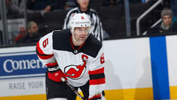 SAN JOSE, CA - MARCH 20: Andy Greene #6 of the New Jersey Devils faces off against the San Jose Sharks at SAP Center on March 20, 2018 in San Jose, California. (Photo by Rocky W. Widner/NHL/Getty Images) *** Local Caption *** Andy Greene