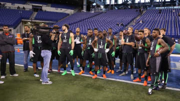 Feb 27, 2016; Indianapolis, IN, USA; Quarterbacks and wide receivers get instructions on the workout drills during the 2016 NFL Scouting Combine at Lucas Oil Stadium. Mandatory Credit: Brian Spurlock-USA TODAY Sports