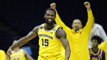 INDIANAPOLIS, INDIANA - MARCH 22: Chaundee Brown #15 of the Michigan Wolverines reacts to a three against the LSU Tigers in the second round game of the 2021 NCAA Men's Basketball Tournament at Lucas Oil Stadium on March 22, 2021 in Indianapolis, Indiana. (Photo by Tim Nwachukwu/Getty Images)