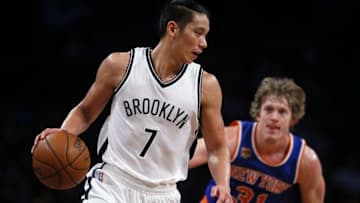 Oct 20, 2016; Brooklyn, NY, USA; New York Knicks guard Ron Baker (31) defends against Brooklyn Nets guard Jeremy Lin (7) during second half at Barclays Center. The New York Knicks defeated the Brooklyn Nets 116-111.Mandatory Credit: Noah K. Murray-USA TODAY Sports