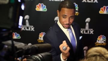 Jan 27, 2015; Phoenix, AZ, USA; NBC Sports analyst Rodney Harrison shows reporters his Super Bowl ring during the NBC Sports Group Press Conference at Media Center-Press Conference Room B. Mandatory Credit: Peter Casey-USA TODAY Sports