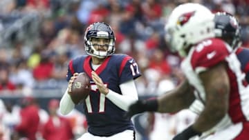Aug 28, 2016; Houston, TX, USA; Houston Texans quarterback Brock Osweiler (17) looks for an open receiver during the second quarter against the Arizona Cardinals at NRG Stadium. Mandatory Credit: Troy Taormina-USA TODAY Sports