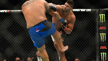 LAS VEGAS, NV - MARCH 04: (R-L) Alistair Overeem of the Netherlands punches Mark Hunt of New Zealand in their heavyweight bout during the UFC 209 event at T-Mobile Arena on March 4, 2017 in Las Vegas, Nevada. (Photo by Jeff Bottari/Zuffa LLC/Zuffa LLC via Getty Images)