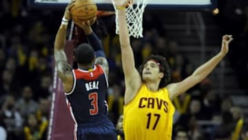 Nov 26, 2014; Cleveland, OH, USA; Cleveland Cavaliers center Anderson Varejao (17) goes for the block on Washington Wizards guard Bradley Beal (3) during the third quarter at Quicken Loans Arena. The Cavaliers beat the Wizards 113-87. Mandatory Credit: Ken Blaze-USA TODAY Sports