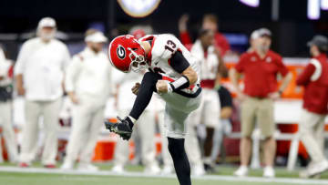 Stetson Bennett reacts after a touchdown in the SEC Championship game. (Photo by Todd Kirkland/Getty Images)